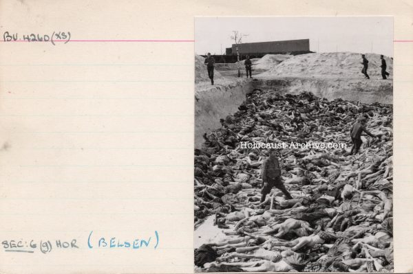 Bergen-Belsen - SS Guard moves bodies to a mass grave