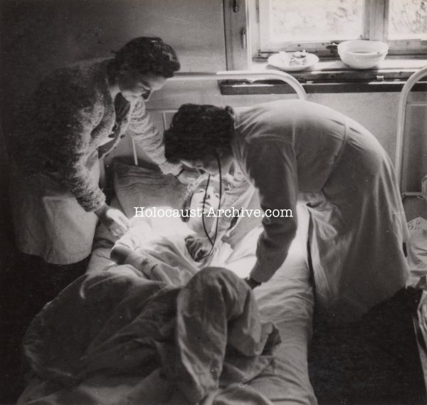 Bergen-Belsen - Photo of a prisoner receiving medical attention