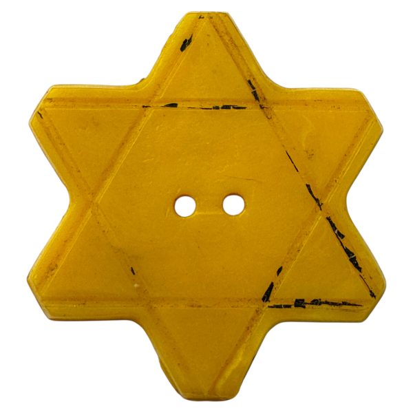 Yellow six-pointed Bakelite Star of David button from Bulgaria, featuring two sewing holes, issued in 1942 as a compulsory identifier for Jewish citizens under antisemitic laws during the Holocaust, enforced by the pro-German Bulgarian government.