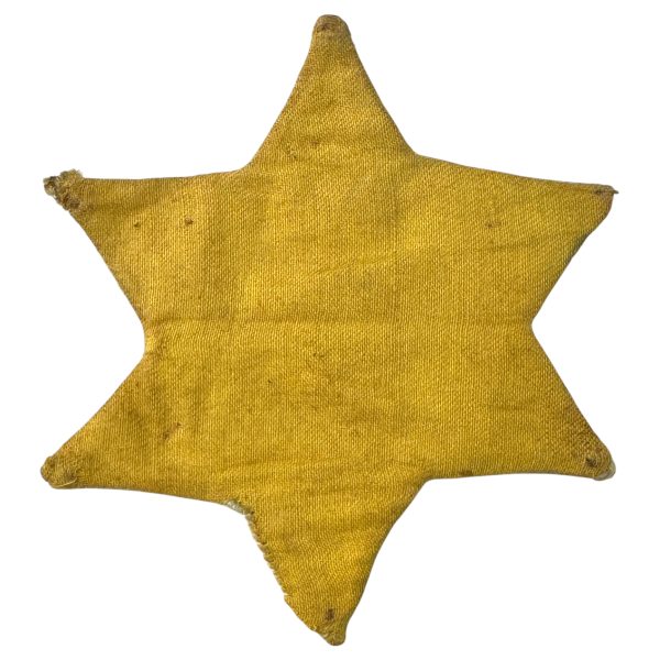 Worn yellow Star of David badge made of coarse fabric, used in Hungary during the Holocaust to identify Jewish people under Nazi persecution.