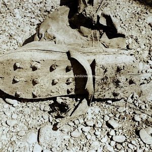 Dachau - American photograph of a prisoners wooden shoe - concentration camp photo