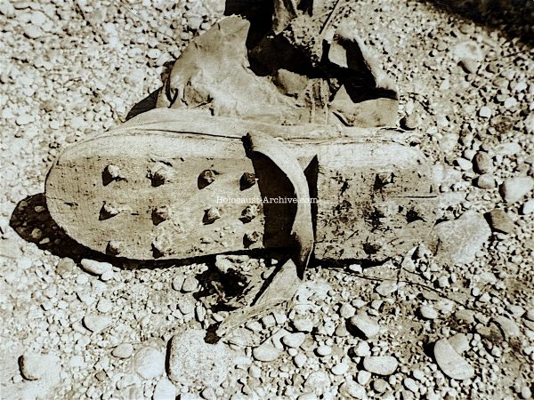 Dachau - American photograph of a prisoners wooden shoe - concentration camp photo