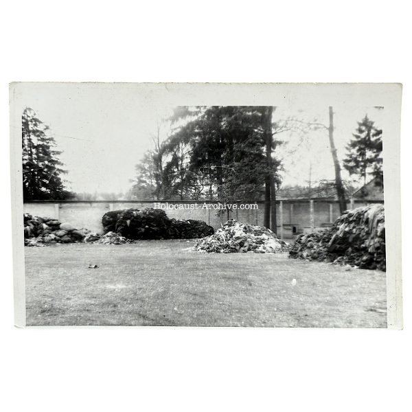 Dachau - American photograph of piles of clothing near Baracke X
